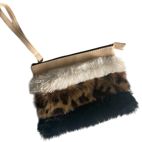 Betsey Johnson Handbags - Betsey Johnson Faux Fur Wristlet Cream and Black with Leopard Print